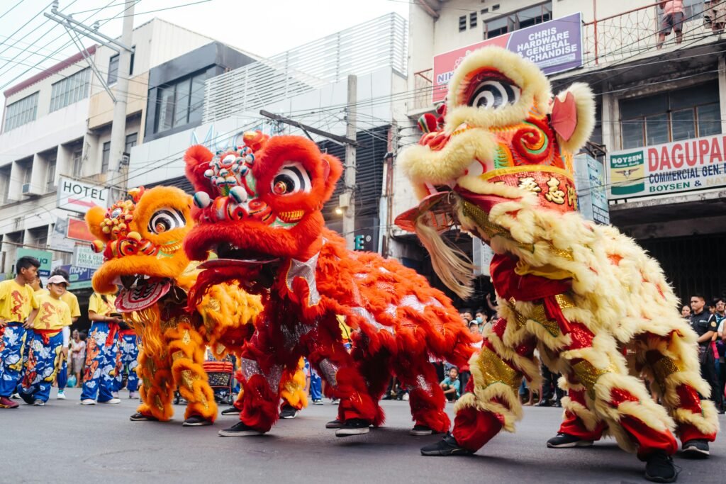A colorful lion dance during Chinese New Year, one of the most vibrant Singapore cultural events. Tripmonks